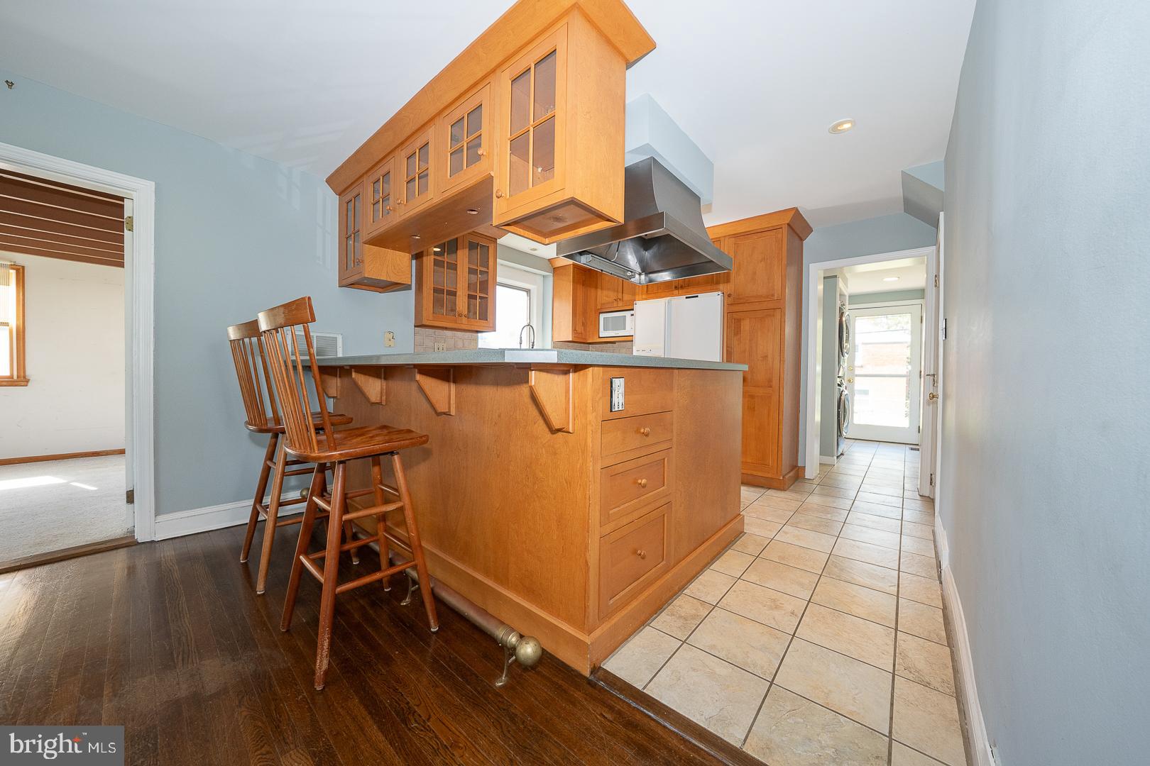 306 Sedgewood Road Springfield, PA 19064 - Photo 10 of 55 a view of a room with wooden floor and windows