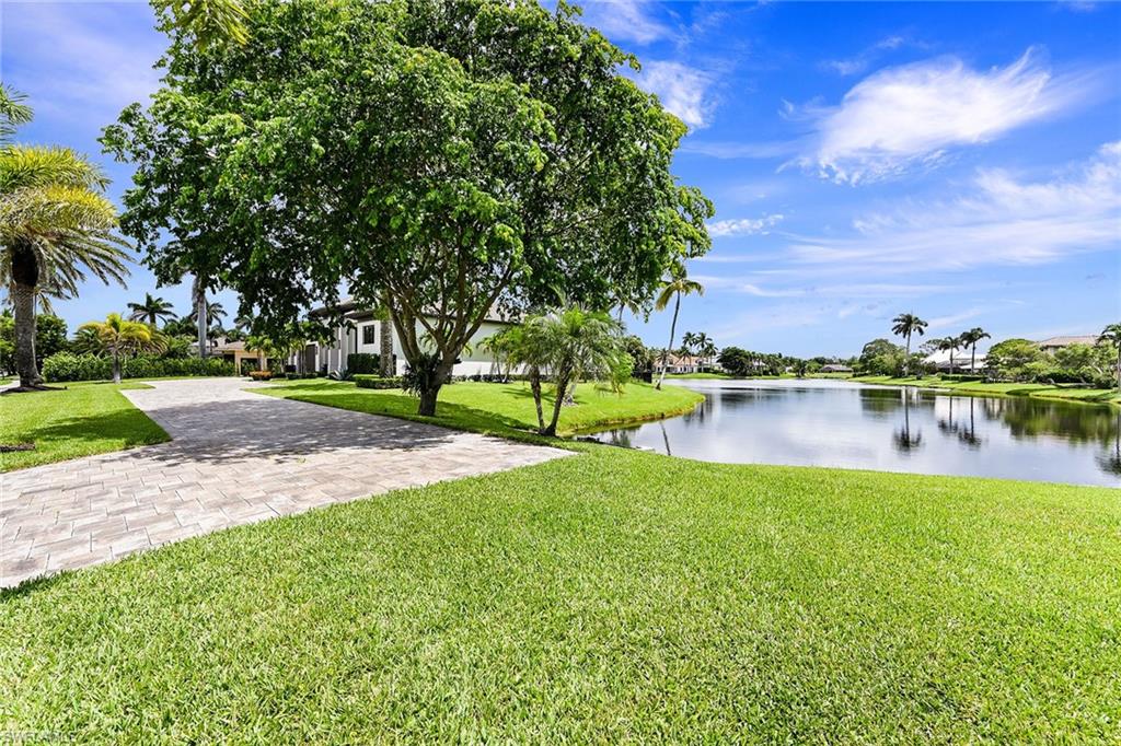 4646 Crayton Road Naples, FL 34103 - Photo 26 of 26 a view of a lake with houses