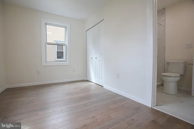 a view of a room that has a window in it