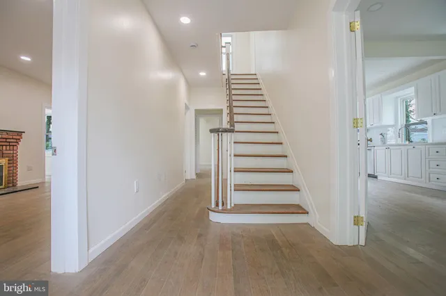 a view of entryway with wooden floor