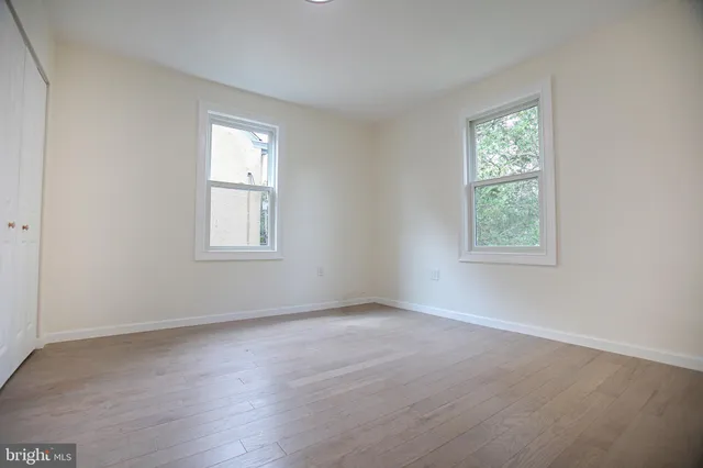an empty room with windows