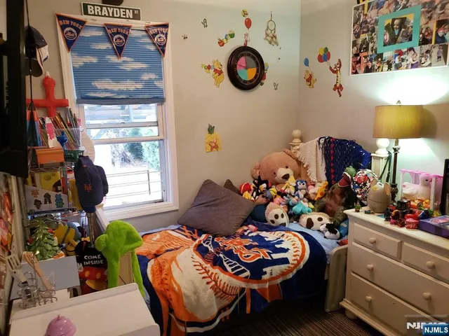 a room with furniture and a window