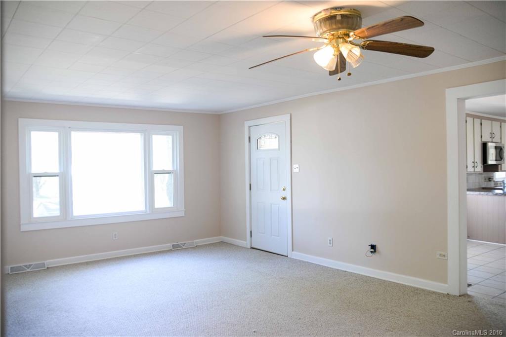 139 Duncan Road Olin, NC 28660 - Photo 11 of 24 a view of an empty room with a window