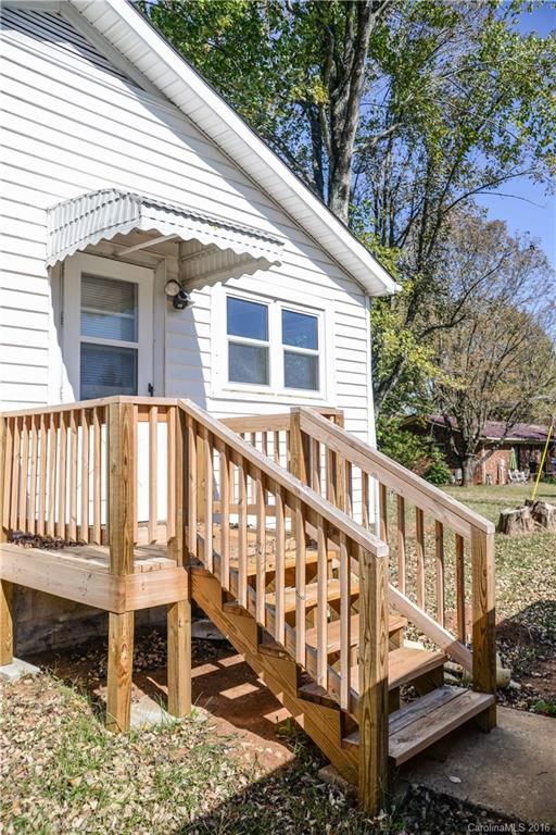 139 Duncan Road Olin, NC 28660 - Photo 3 of 24 a front view of a house with a yard