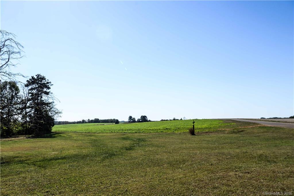 139 Duncan Road Olin, NC 28660 - Photo 6 of 24 a view of grassy field with trees