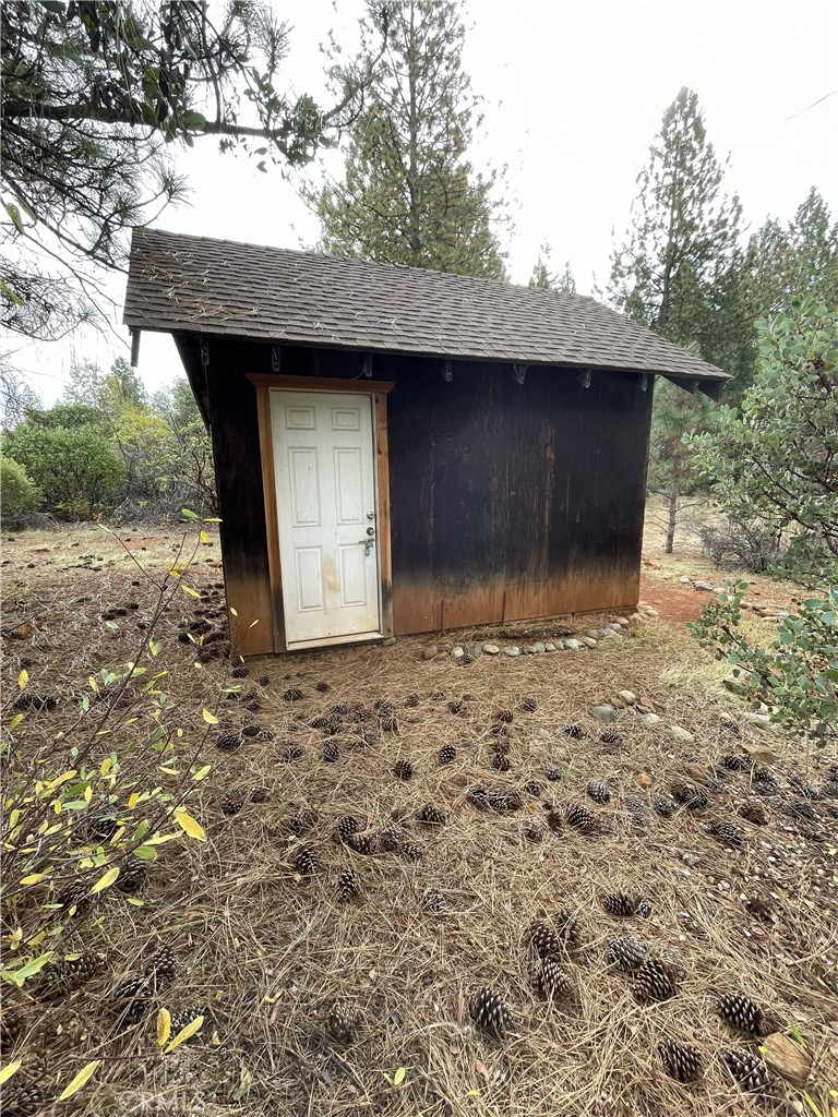 0 Fitzgerald Drive Forest Ranch, CA 95942 - Photo 2 of 3 a stone house with a outdoor space