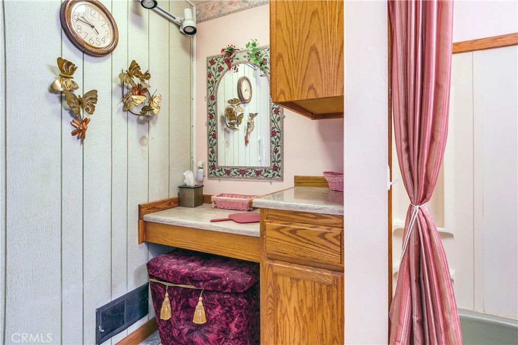 9339 Wood Road Forest Falls, CA 92339 - Photo 27 of 48 a bathroom with a sink and a mirror