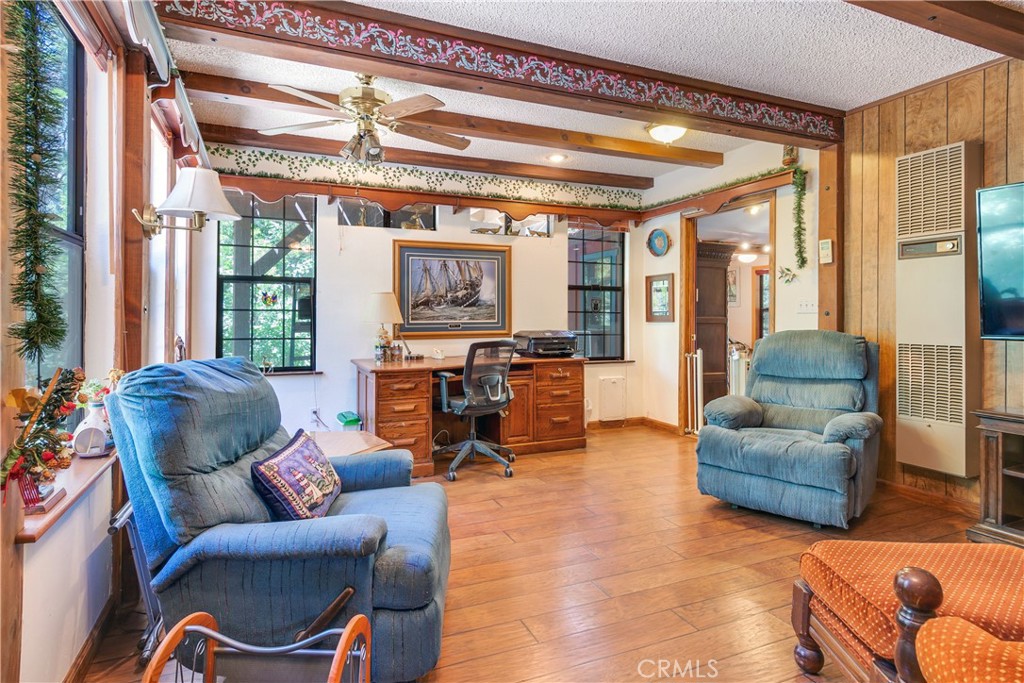 9339 Wood Road Forest Falls, CA 92339 - Photo 28 of 48 a living room with furniture and a large window