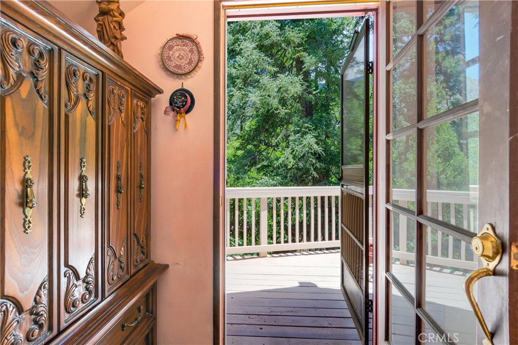 9339 Wood Road Forest Falls, CA 92339 - Photo 34 of 48 a view of a porch with wooden floor