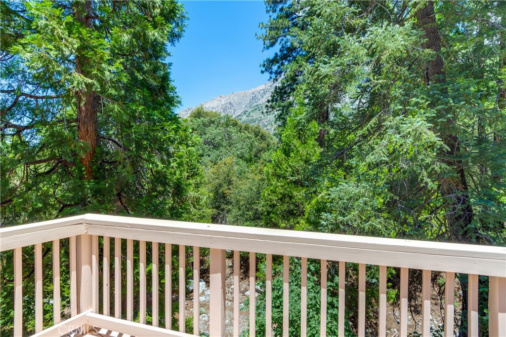 9339 Wood Road Forest Falls, CA 92339 - Photo 35 of 48 a view of a balcony with outdoor space
