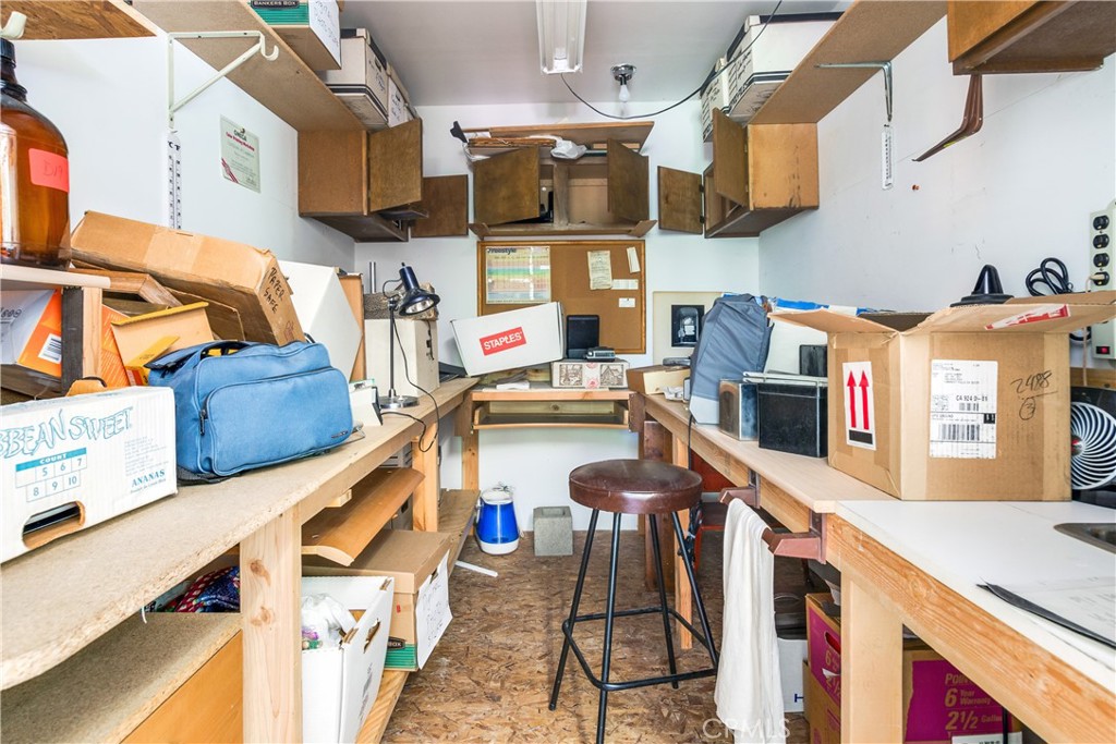 9339 Wood Road Forest Falls, CA 92339 - Photo 40 of 48 a kitchen with stainless steel appliances granite countertop a sink and a stove