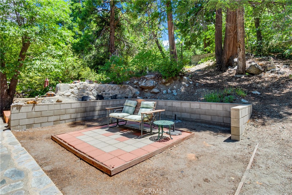 9339 Wood Road Forest Falls, CA 92339 - Photo 4 of 48 a view of a backyard with sitting area