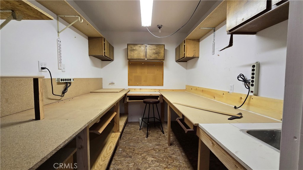 9339 Wood Road Forest Falls, CA 92339 - Photo 44 of 48 a bathroom with a sink and a bathtub