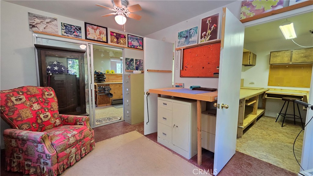 9339 Wood Road Forest Falls, CA 92339 - Photo 46 of 48 a view of living room with furniture and a flat screen tv