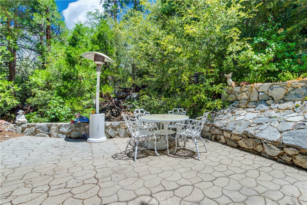9339 Wood Road Forest Falls, CA 92339 - Photo 6 of 48 a view of backyard with furniture