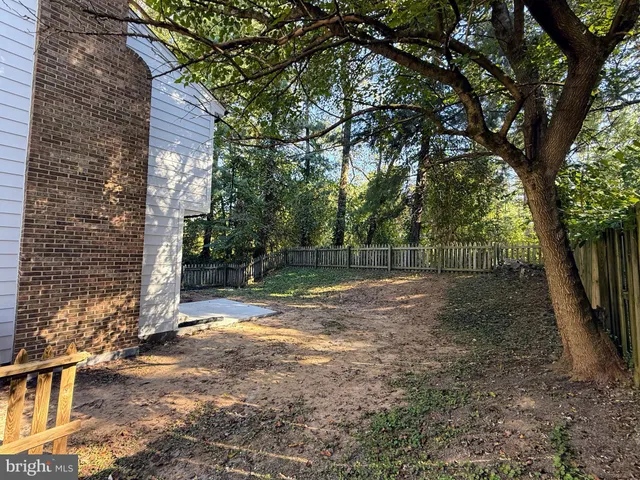 a view of backyard with green space