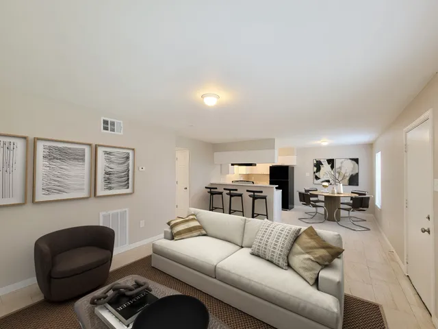 a living room with furniture and a couch