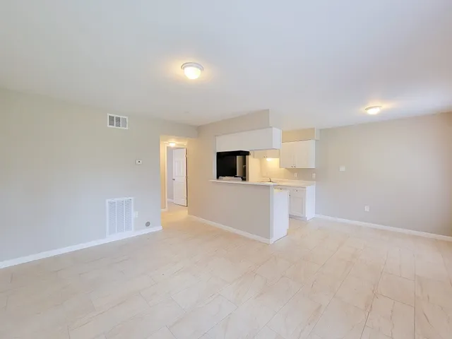 a view of a kitchen with a sink