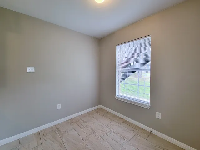 an empty room with a window