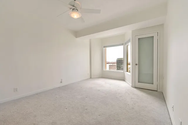 an empty room with a bathroom