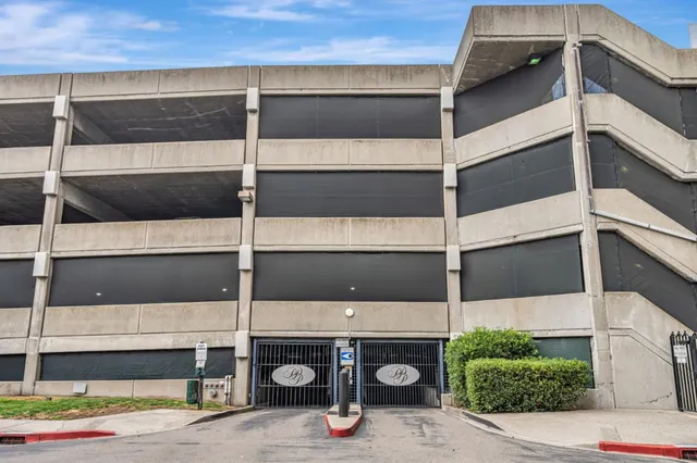 a view of a building with a park