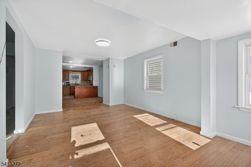 136 Smith Street Elizabeth, NJ 07201 - Photo 4 of 45 a view of livingroom with furniture and windows