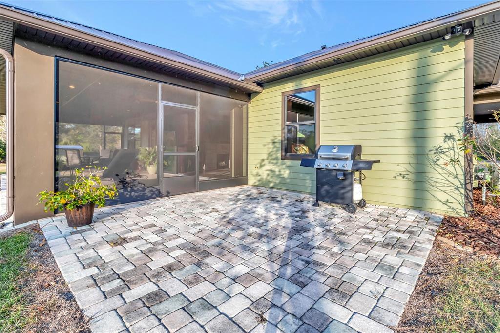 7330 Crabgrass Road St. Cloud, FL 34773 - Photo 34 of 60 a front view of a house with a porch