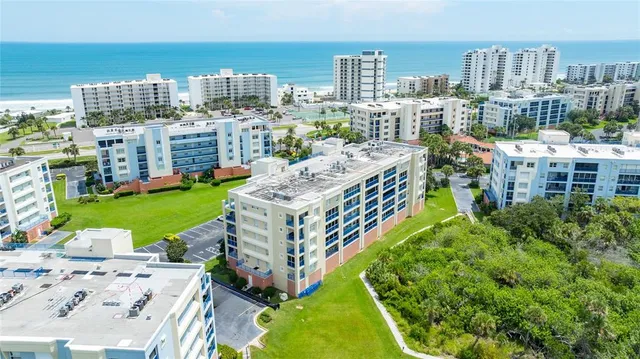 a view of an buildings with a garden