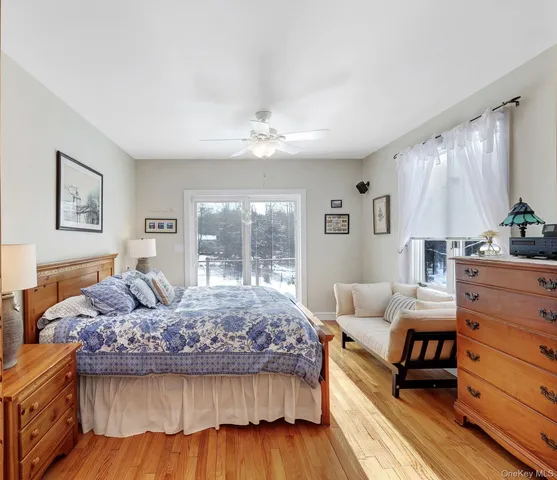 a bathroom with a shower toilet and sink
