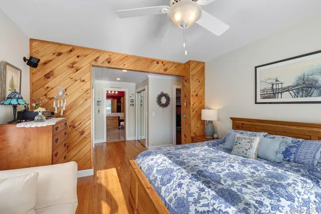 a view of a hallway with seating space