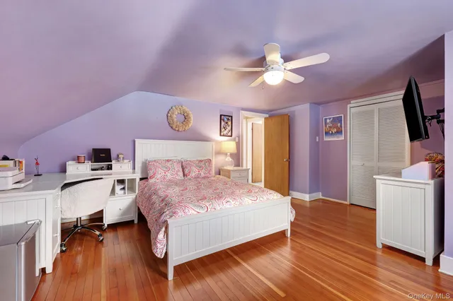 a view of house with a yard covered in snow