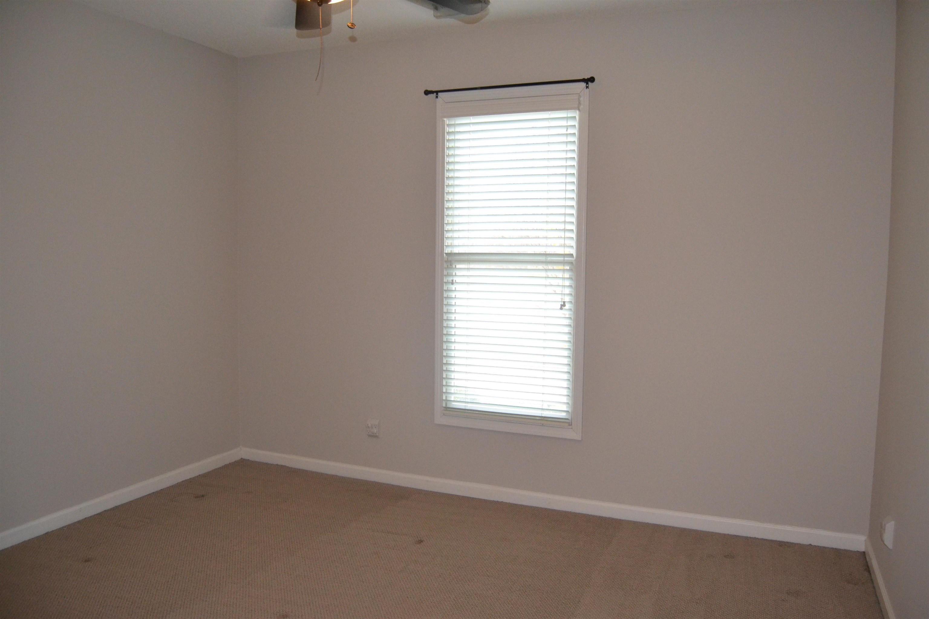 10486 Juneau Way Collierville, TN 38017 - Photo 21 of 33 Unfurnished room featuring ceiling fan and carpet