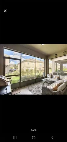 a view of living room with balcony
