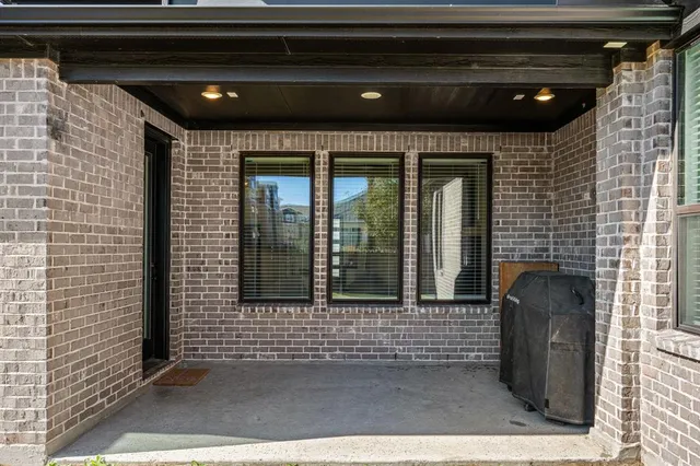 a front view of a house with a garage