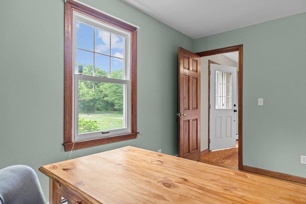 140 I Long Highway Little Compton, RI 02837 - Photo 15 of 41 a bedroom with a bed and a window