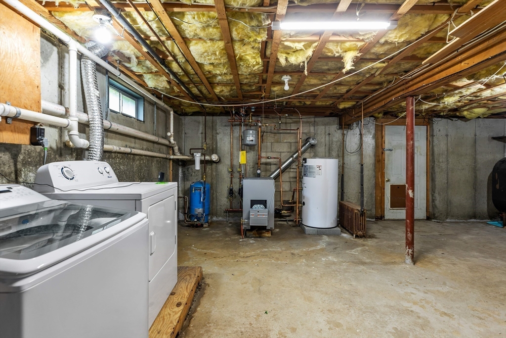 140 I Long Highway Little Compton, RI 02837 - Photo 24 of 41 a utility room with dryer and washer