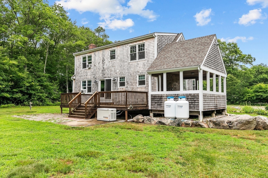 140 I Long Highway Little Compton, RI 02837 - Photo 25 of 41 front view of a house with a yard