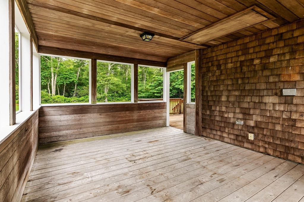 140 I Long Highway Little Compton, RI 02837 - Photo 28 of 41 a view of empty room with wooden floor and walls