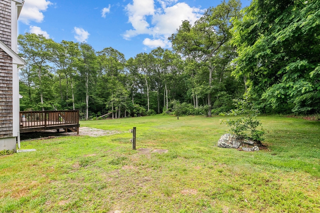 140 I Long Highway Little Compton, RI 02837 - Photo 33 of 41 a backyard of a house with lots of green space
