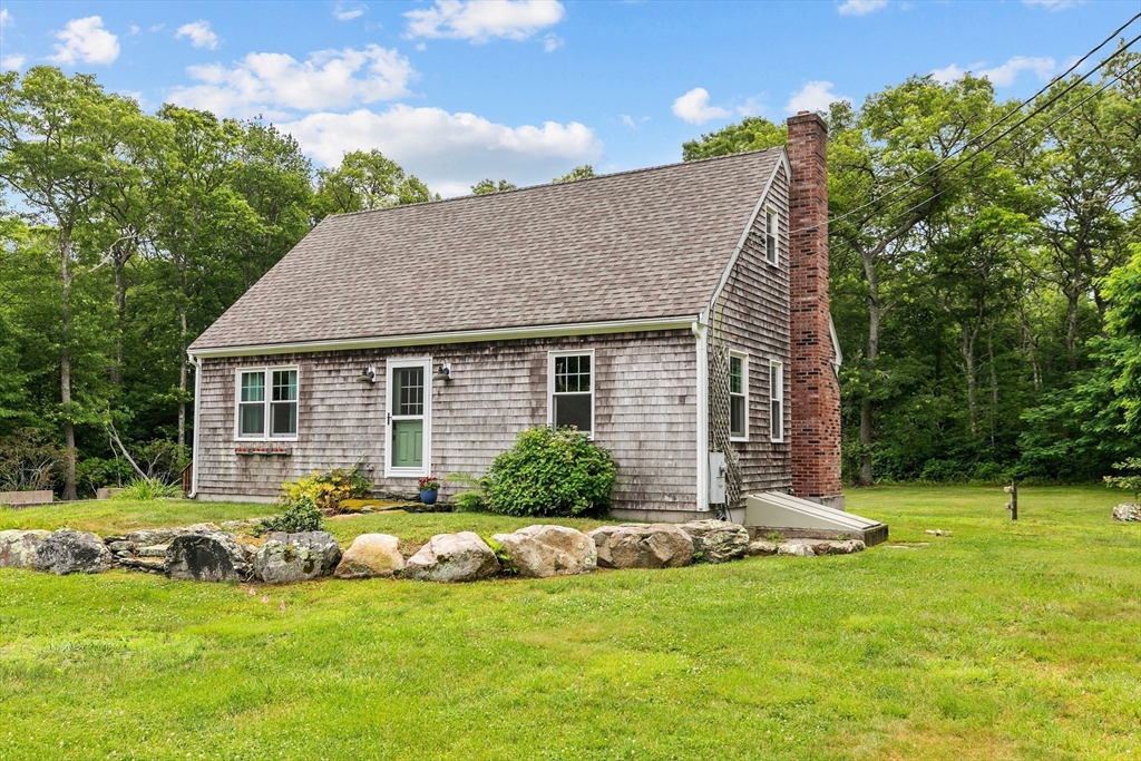 140 I Long Highway Little Compton, RI 02837 - Photo 34 of 41 a view of a house with a yard and sitting area
