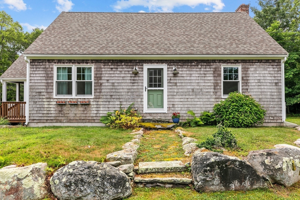 140 I Long Highway Little Compton, RI 02837 - Photo 5 of 41 a front view of a house with a yard
