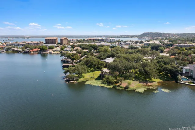 a view of a street with a building in the background