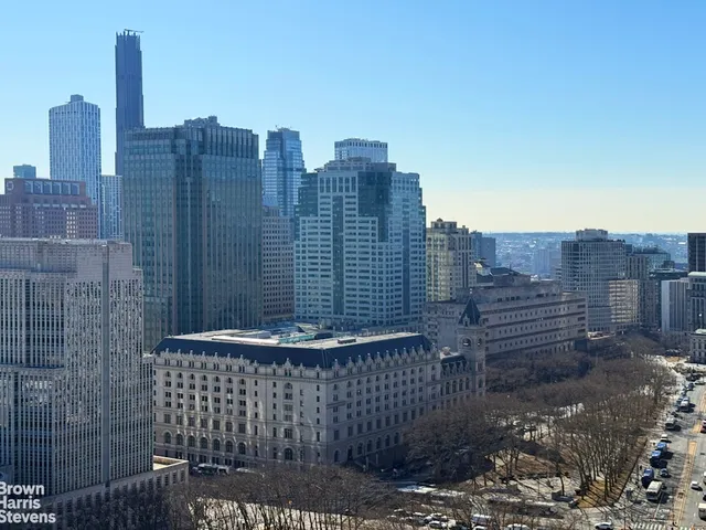 a view of a city with tall buildings