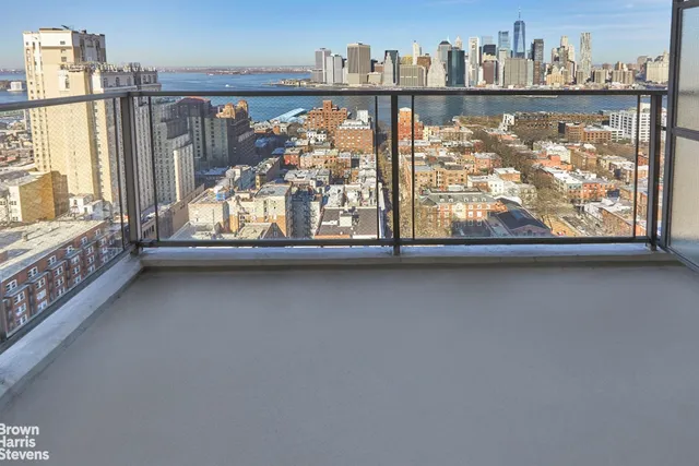 a view of a city with tall buildings