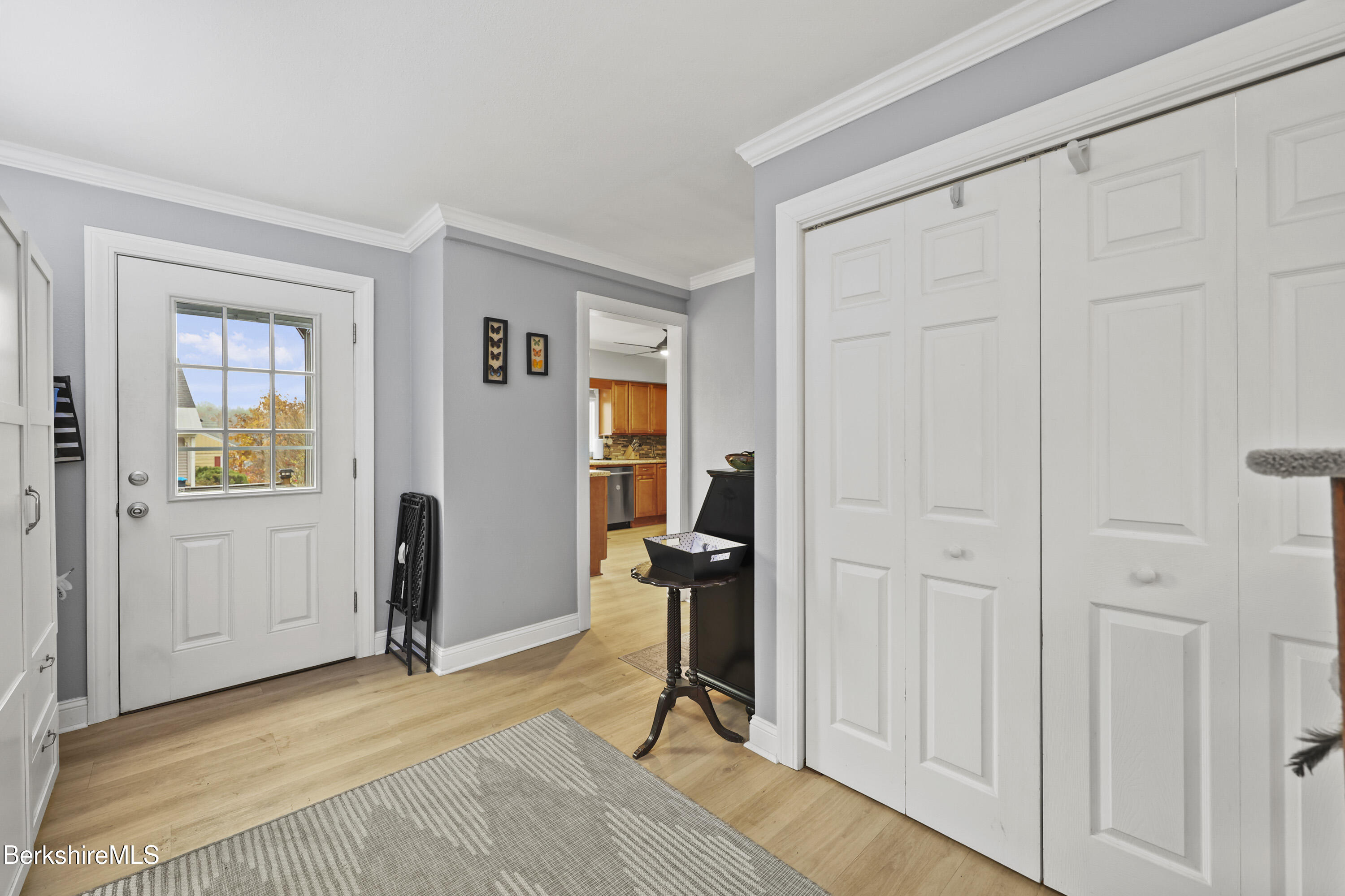 386 Cheshire Road Pittsfield, MA 01201 - Photo 19 of 45 a view of a livingroom with furniture and a window