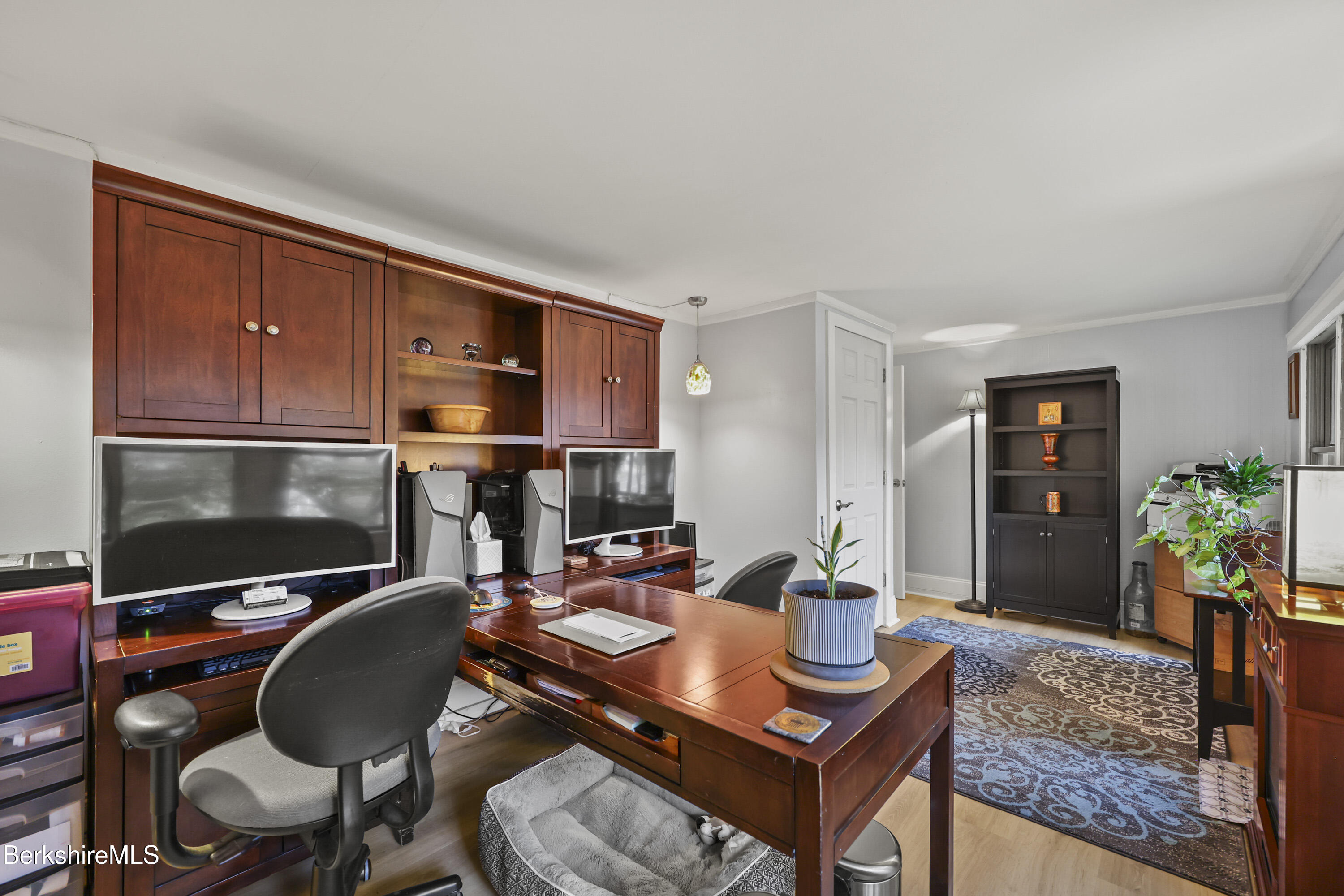 386 Cheshire Road Pittsfield, MA 01201 - Photo 34 of 45 a work room with furniture and a potted plant