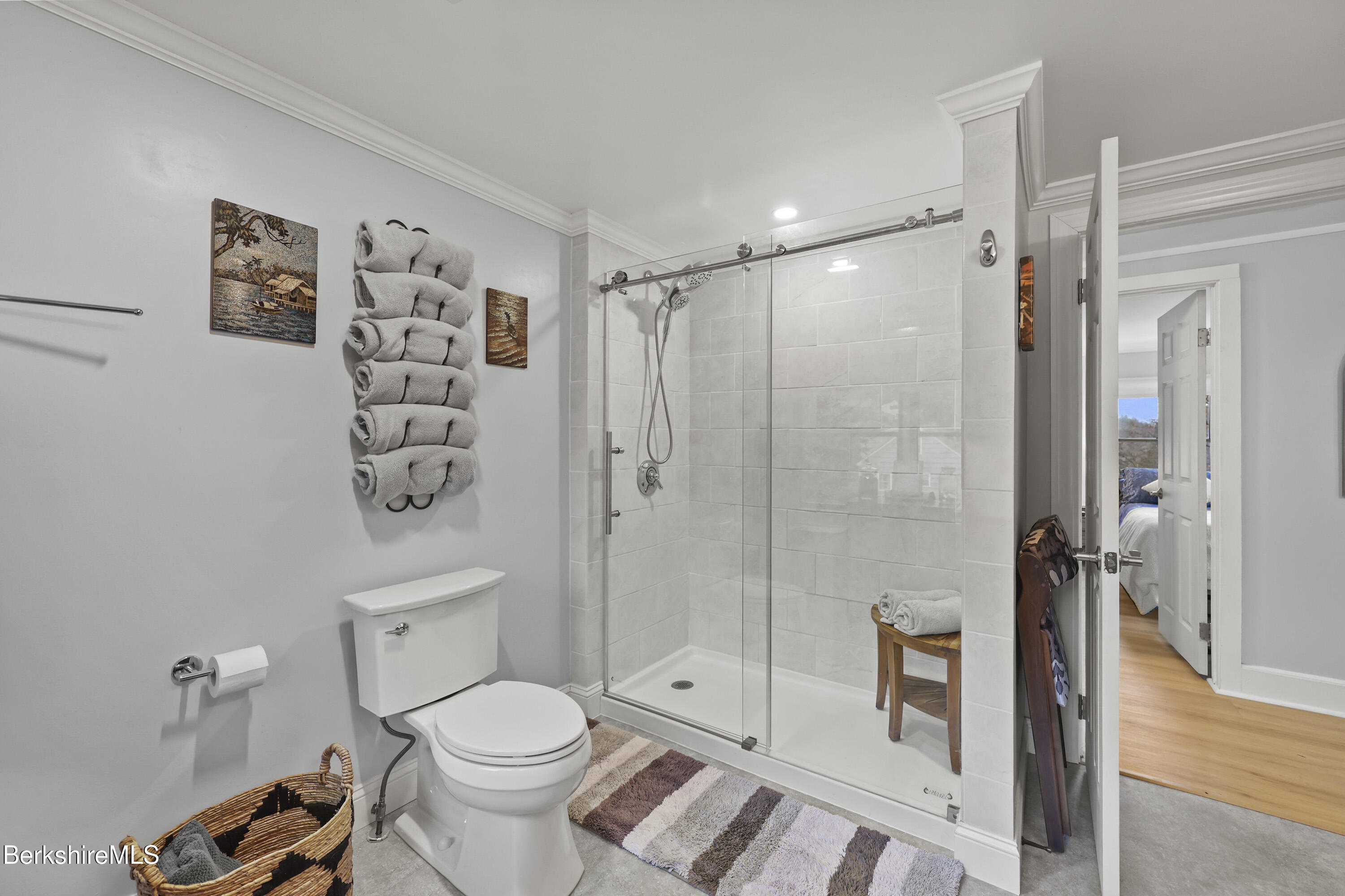 386 Cheshire Road Pittsfield, MA 01201 - Photo 36 of 45 a bathroom with a toilet sink and a shower