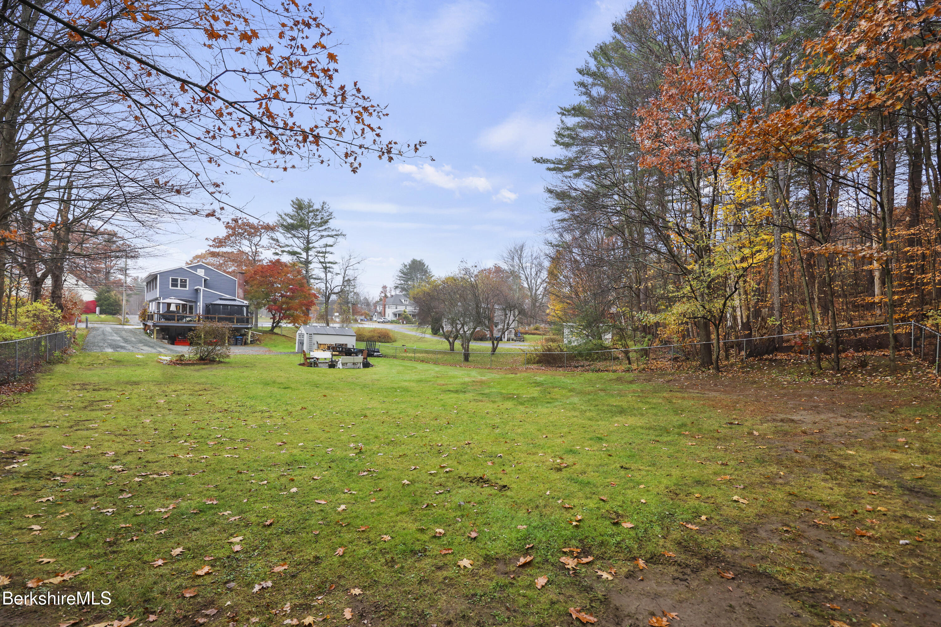 386 Cheshire Road Pittsfield, MA 01201 - Photo 43 of 45 a view of outdoor space with garden and trees