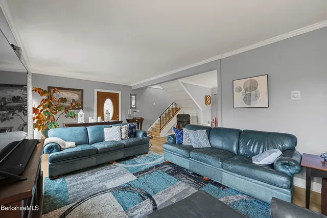 a living room with furniture and a couch