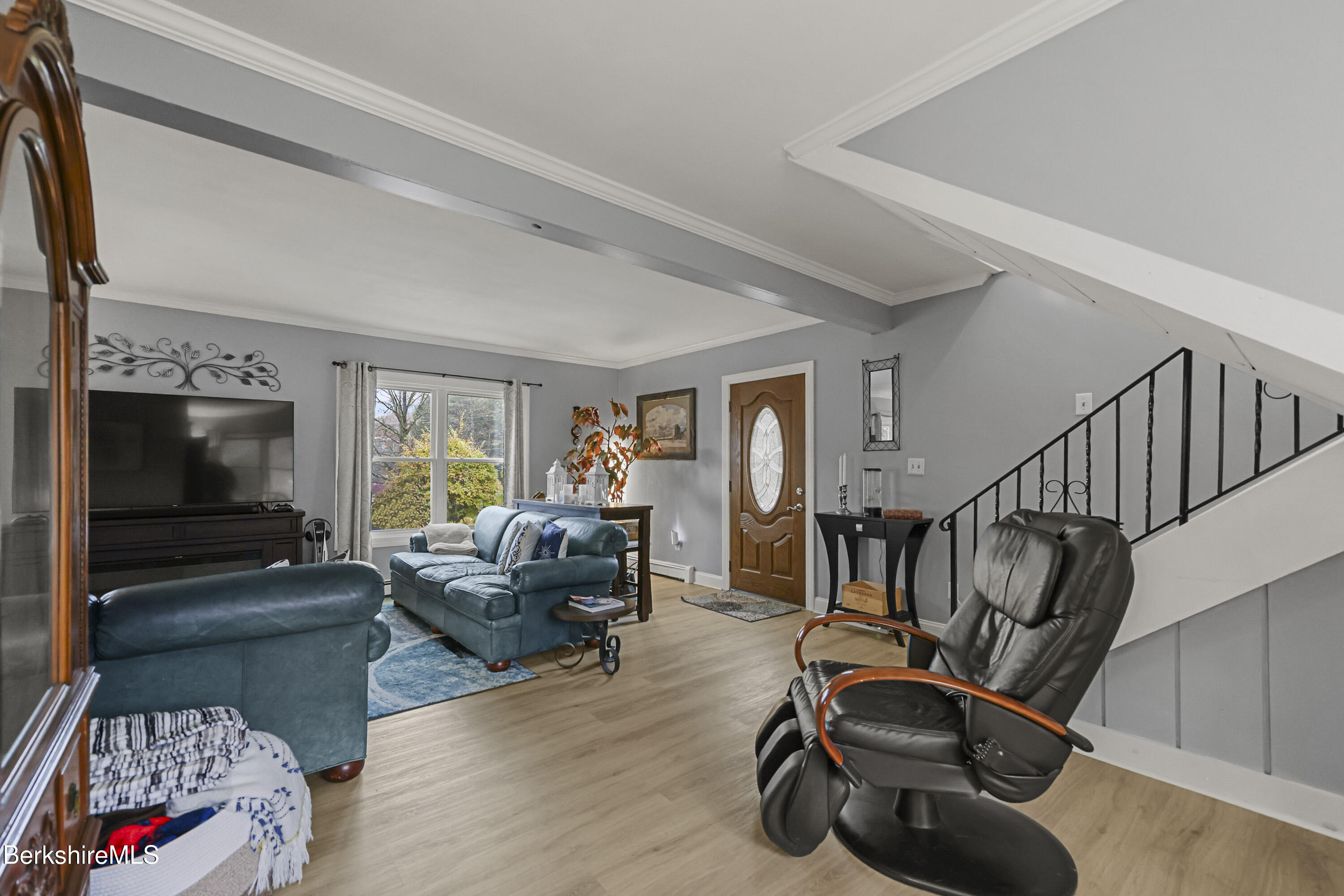 386 Cheshire Road Pittsfield, MA 01201 - Photo 9 of 45 a living room with furniture and a flat screen tv